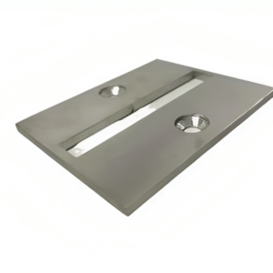 Satin finish stainless steel rectangular base plate with two countersunk holes and central slot.
